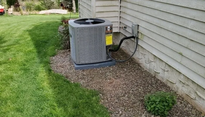 Outdoor AC condenser unit installed beside a Reading PA home by JB Plumbing HVAC