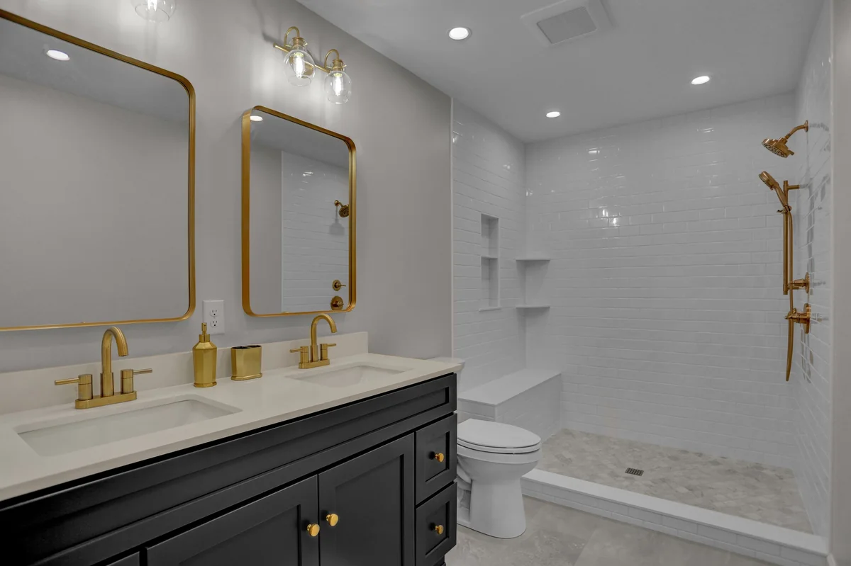 Bathroom remodel with walk-in shower and double vanity by JB Plumbing HVAC in Reading PA