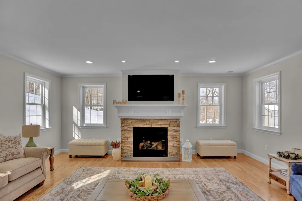 Living room construction remodel with fireplace detail by JB Plumbing HVAC